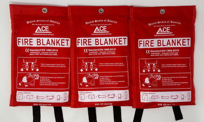 Three red fire blankets in carry cases, labeled ACE Fire Defense.
