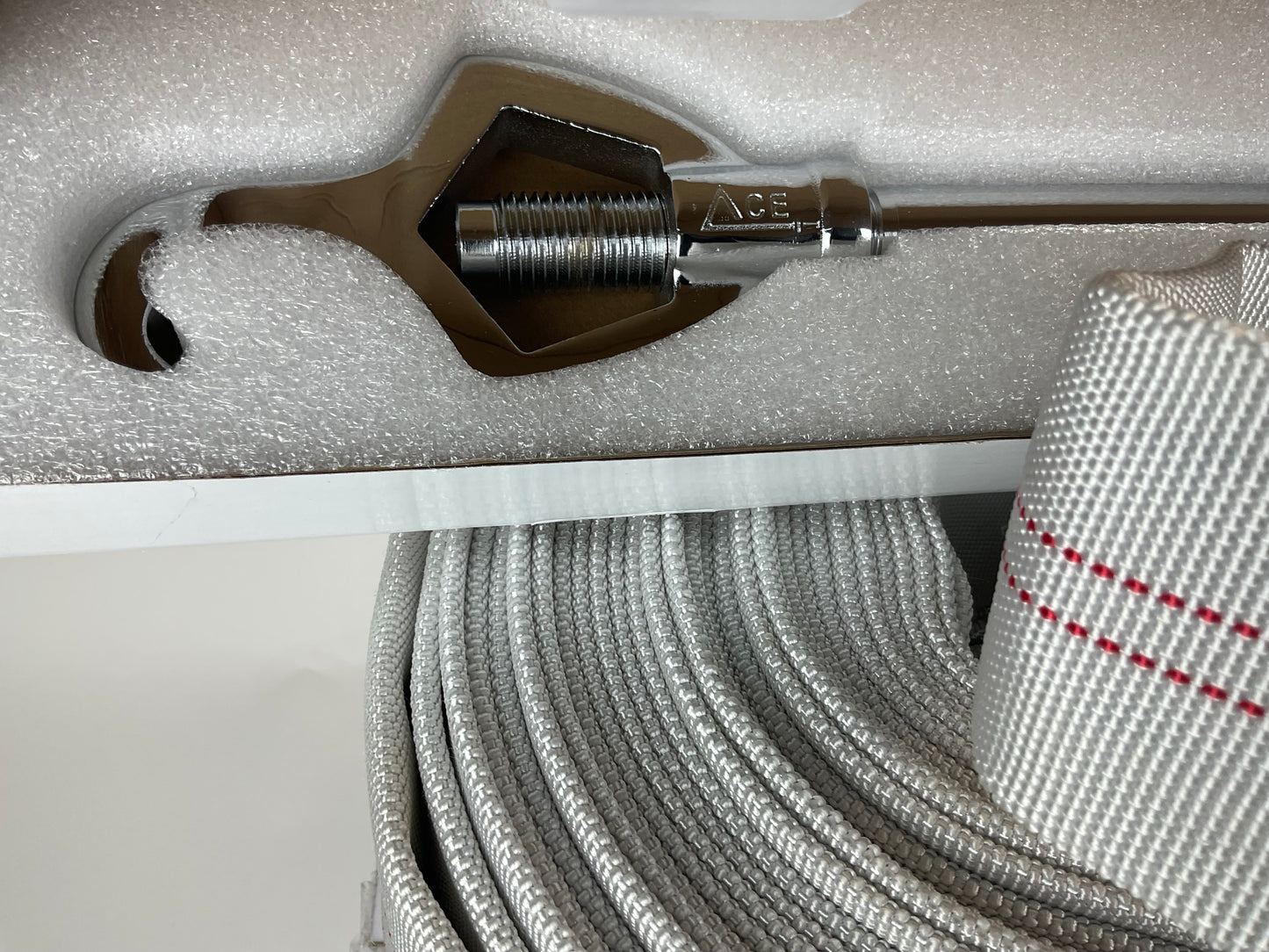 fire hose with adjustable wrench
