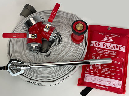 Fire hose with nozzle, wrench, and fire blanket on a white background