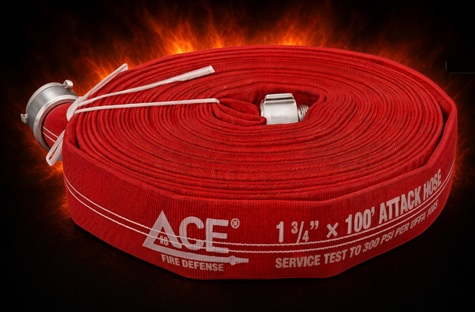 A coiled red fire attack hose with silver metal connectors, featuring white printed text and logo, set against a dark background with a fiery orange glow.